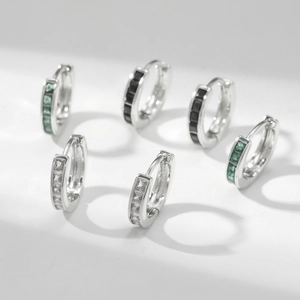 Silver huggie hoop earrings with square zircon in white, black, and emerald green