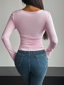 Back view of pink Y2K square neck long sleeve top showing slim fit cut and soft fabric