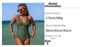 Detail view of olive green one-piece swimsuit with mesh panels and ruched tummy control