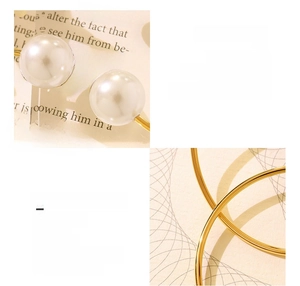 Detail of 18K gold-plated titanium steel cuff bracelet featuring two elegant faux pearls