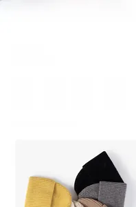 Detailed view of ribbed knit beanies in yellow, black, and gray with warm texture