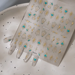 Embossed turquoise and gold star-moon heart nail art stickers with 3D texture effect