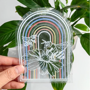 Detail of bee and floral rainbow arch suncatcher static cling glass window sticker