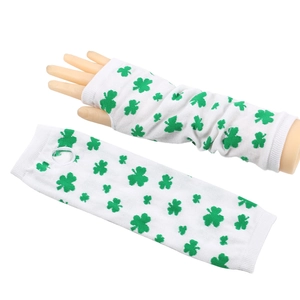 Detail of fingerless knit arm warmers featuring green shamrock patterns for St. Patrick's Day
