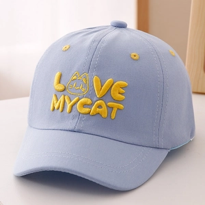 Close-up of yellow LOVE MY CAT 3D embroidery on a light blue cotton kids baseball cap