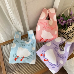 Cute animal print knitted tote bags with white polka dots in blue, pink, and purple colors