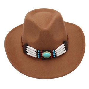 Close-up of brown cowboy hat with ethnic beads and turquoise stone decorative band