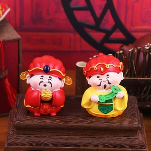 Two Chinese God of Wealth figurines with gold ingot and ruyi on wooden base