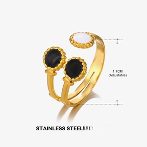 Detail view of adjustable stainless steel ring with white and black enamel inlay and 1.7cm size