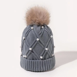 Winter gray cable knit beanie with faux pearls and a large fluffy brown pompom