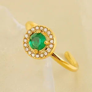 Elegant gold titanium steel open ring with emerald green zircon and pavé crystal halo