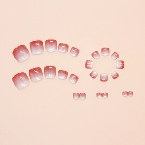 Detail view of 24pcs pink gradient cat eye shimmer press-on toenails on plain background