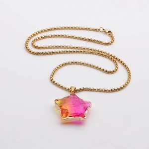 Golden box chain necklace featuring a colorful faceted star pendant on white background