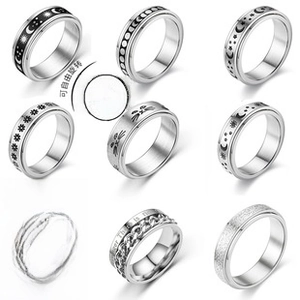 Detailed collection of rotatable stainless steel stress relief rings with various patterns