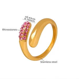 Macro view of 18K gold-plated stainless steel ring with pavé-set pink rhinestones