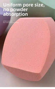 Macro shot of fine pores on a large pink multi-cut makeup sponge for smooth application