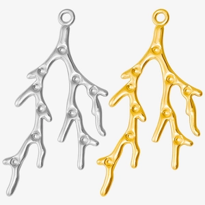 Detail of coral branch pendants in gold and silver finish made of 304 stainless steel