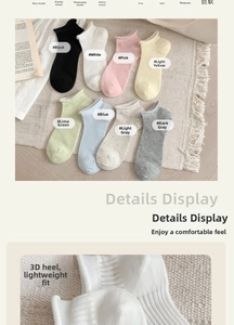 Detailed close-up of ribbed cotton ankle socks in multiple colors with ergonomic heel design