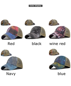 Detail view of tie-dye mesh ponytail baseball caps in multiple color variants