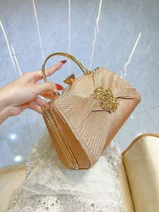 Elegant gold pleated rhinestone evening clutch bag with crystal brooch handle for formal wear