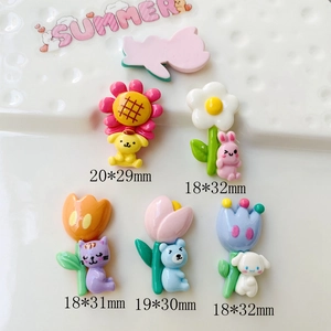 Detailed view of DIY resin charms with measurements for cartoon dog and flower designs