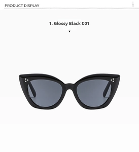 Front view of black cat eye sunglasses with three silver metal rivets on the frame