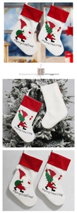 Set of two Christmas stockings with embroidered Santa motifs and merry christmas text