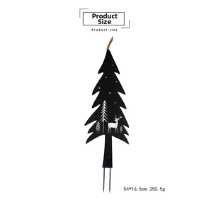 Detail of Christmas tree metal garden stake featuring deer cutout and dual spikes
