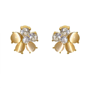 Elegant gold flower stud earrings featuring champagne cat eye stones and clear zircons