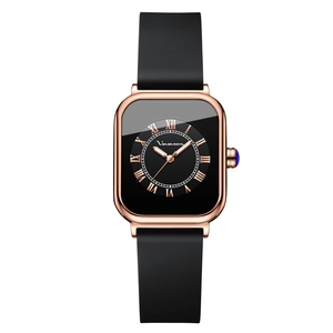 Elegant rose gold square quartz watch with black silicone strap and Roman numerals