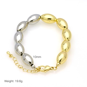 Detail of 10mm gold and silver beaded bracelet with lobster clasp and extension chain