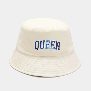 Detail of QUEEN galaxy print embroidery on off-white cotton fisherman bucket hat