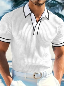 Close-up of white ribbed knit men's Polo shirt with black striped collar in outdoor setting
