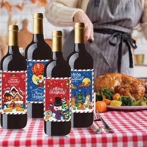 Autocollants de bouteille de vin Merry Christmas avec bonhomme de neige sur table festive