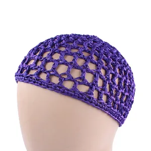 Detail showing deep purple crochet hair net with hexagonal mesh on a model