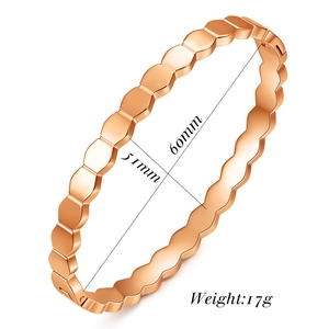 Macro view of rose gold hexagonal honeycomb bangle with 60mm inner diameter dimensions