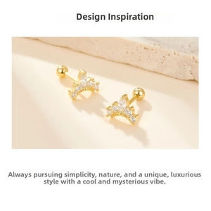 Macro shot of crown-shaped S925 sterling silver earrings with micro-set zircon accents