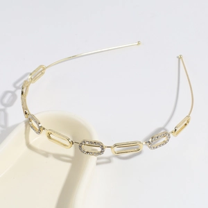 Golden hollow chain headband with oval links and sparkling crystal rhinestones