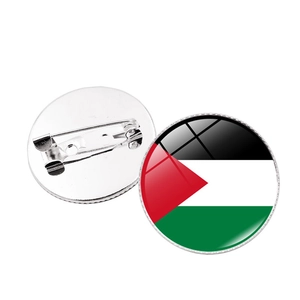Detailed front and back view of crystal glass UAE flag brooch with metal pin clasp