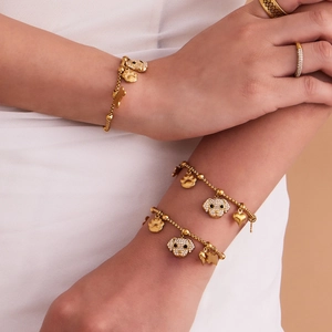 Bracelets en acier inoxydable plaqué or 18 carats avec breloques os et cœur pour femme