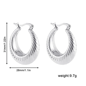 Detail showing 31mm silver chunky C-shaped hoop earrings with precise size dimensions