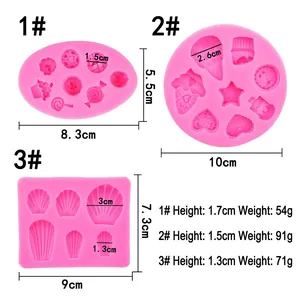 Pink silicone molds for DIY cake decorating with seashell and candy shapes set