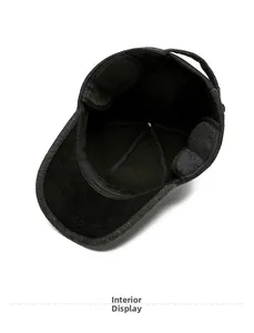 Detail view of winter baseball cap showing warm black fleece lining and ear flaps
