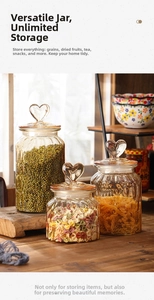 Detailed view of amber glass storage jars with heart-shaped lids and ribbed texture