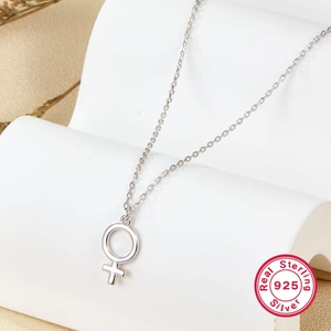 Minimalist S925 sterling silver necklace with female symbol pendant on display stand