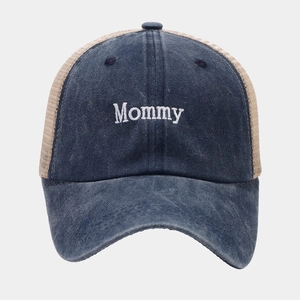 Detail of Mommy embroidery on vintage washed denim and breathable mesh trucker cap