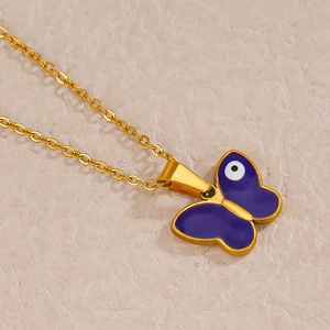 Golden butterfly necklace with blue enamel wing and evil eye detail for women