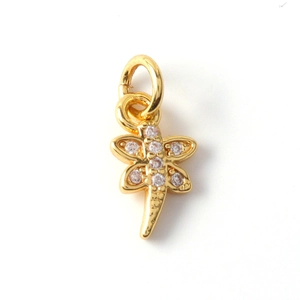 Close-up of gold-plated dragonfly charm pendant with sparkling cubic zirconia pavé setting