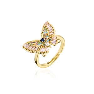 Detail shot of golden butterfly ring with colorful cubic zirconia and 18K gold plating