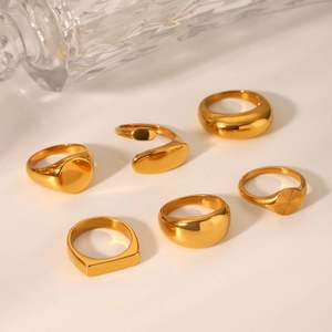Detailed view of 18K gold plated stainless steel rings set in minimalist designs